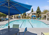 Thumbnail 10 of 20 - our apartments have a swimming pool with chairs and umbrellas