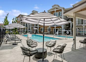 Thumbnail 13 of 24 - Pool and lounge chairs at Hearth