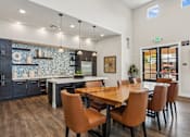 Thumbnail 16 of 30 - the reserve at city center amenities dining room and kitchen