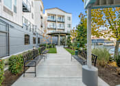 Thumbnail 16 of 19 - Paved grounds at Maddox Apartments