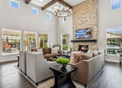 Thumbnail 15 of 30 - the preserve at ballantyne commons living room with couches and a fireplace