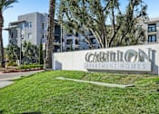 Thumbnail 24 of 28 - The image shows a sign for Carillon Apartment Homes
