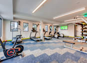 Thumbnail 14 of 21 - Fitness Room at The Rylan Apartments