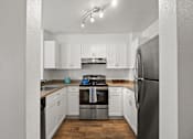 Thumbnail 3 of 22 - Unfurnished Kitchen at Del Norte Place Apartment Homes