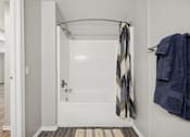 Thumbnail 19 of 29 - A bathroom with a towel hanging on the wall.