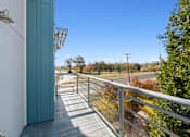 Thumbnail 11 of 19 - Patio at Maddox Apartments