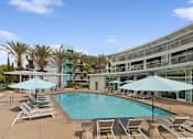 Thumbnail 10 of 15 - Spacious pool and pool deck at Domain San Diego