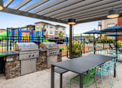 Thumbnail 28 of 37 - Grill area at Zera at Reed Crossing