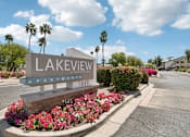 Thumbnail 19 of 24 - A sign for Lakeview Apartments with a phone number on it.