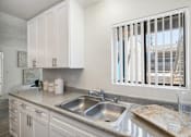 Thumbnail 2 of 23 - Kitchen Views at The District Apartment Homes