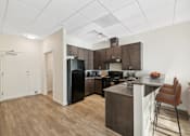 Thumbnail 8 of 19 - Kitchen area at Maddox Apartments