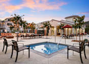 Thumbnail 14 of 24 - Cool Blue Swimming Pool at Mitchell Place Apartments, California