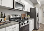 Thumbnail 2 of 24 - Fully Equipped Kitchen In Clubhouse at Mitchell Place Apartments, California