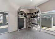 Thumbnail 19 of 24 - gym with free weights at Pointe Luxe Apartment Homes, San Diego, CA, 92110