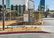 Thumbnail 22 of 23 - Front Entrance at The District Apartment Homes