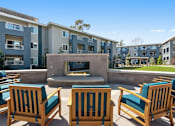 Thumbnail 16 of 24 - outdoor fireplace at Pointe Luxe Apartment Homes, San Diego, CA, 92110