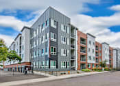 Thumbnail 1 of 34 - a new apartment building on a city street