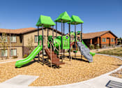 Thumbnail 17 of 18 - Outdoor Playground at North Peak Apartments