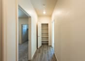 Thumbnail 7 of 18 - Long Hallway at North Peak Apartments