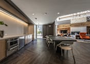 Thumbnail 16 of 28 - resident social lounge and kitchen at Capitol650