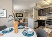 Thumbnail 3 of 13 - Fully Equipped Kitchens And Dining at Somerfield at Lakeside Apartments, California