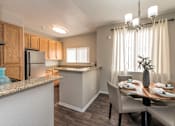 Thumbnail 3 of 32 - Dining Room and Kitchen View at Atwood Apartments, California, 95610