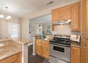 Thumbnail 2 of 32 - Granite Countertop Kitchen at Atwood Apartments, Citrus Heights, CA, 95610