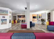 Thumbnail 18 of 24 - a room with couches and chairs and paintings on the walls