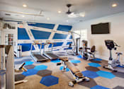 Thumbnail 21 of 34 - Clubhouse Fitness Room at Stone Cliff Apartments
