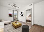 Thumbnail 4 of 24 - a living room with white walls and a ceiling fan