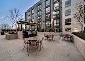 Thumbnail 17 of 30 - Courtyard with seating and BBQ