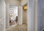Thumbnail 10 of 31 - a bathroom with a toilet and a closet