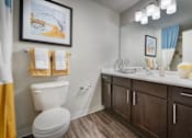Thumbnail 7 of 31 - the preserve at ballantyne commons apartments bathroom with toilet and sink