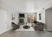 Thumbnail 3 of 18 - the living room of an apartment with couches and a table