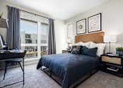Thumbnail 16 of 22 - Main Furnished Bedroom at Eleanor
