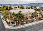 Thumbnail 19 of 20 - A street view of a residential area with a sign that reads "Pearl".