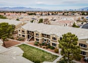 Thumbnail 12 of 20 - A bird's eye view of a residential area with houses and trees.