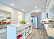 Thumbnail 2 of 37 - spacious kitchen with an island at Aya Apartments