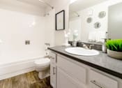 Thumbnail 5 of 27 - bathroom with sink toilet and tub