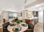 Thumbnail 6 of 23 - Furnished Kitchen Table at The Lexington Apartments