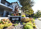 Thumbnail 16 of 17 - the sign in front of the Pallas Apartments and Townhomes