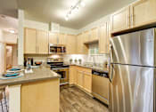 Thumbnail 2 of 15 - Refrigerator with Ice Maker, at Newberry Square Apartments, Lynnwood, Washington