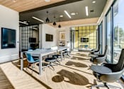 Thumbnail 13 of 23 - coworking space with a long table and chairs and large windows
