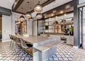 Thumbnail 12 of 23 - resident social lounge kitchen at Novo Apartments