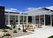 Thumbnail 23 of 24 - Seating Exterior at Parq Crossing Apartments
