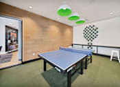 Thumbnail 15 of 30 - a ping pong table in the center of a room