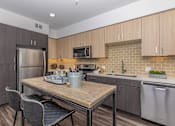 Thumbnail 11 of 40 - Island Kitchen Views at The Platform Urban Apartments