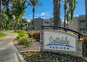 Thumbnail 21 of 21 - the sign at the entrance of scottsdale hotel on a tree lined street