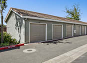 Thumbnail 28 of 30 - A row of garage doors are closed.