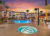 Thumbnail 14 of 28 - Pool at twilight at Tribeca North Apartment Homes